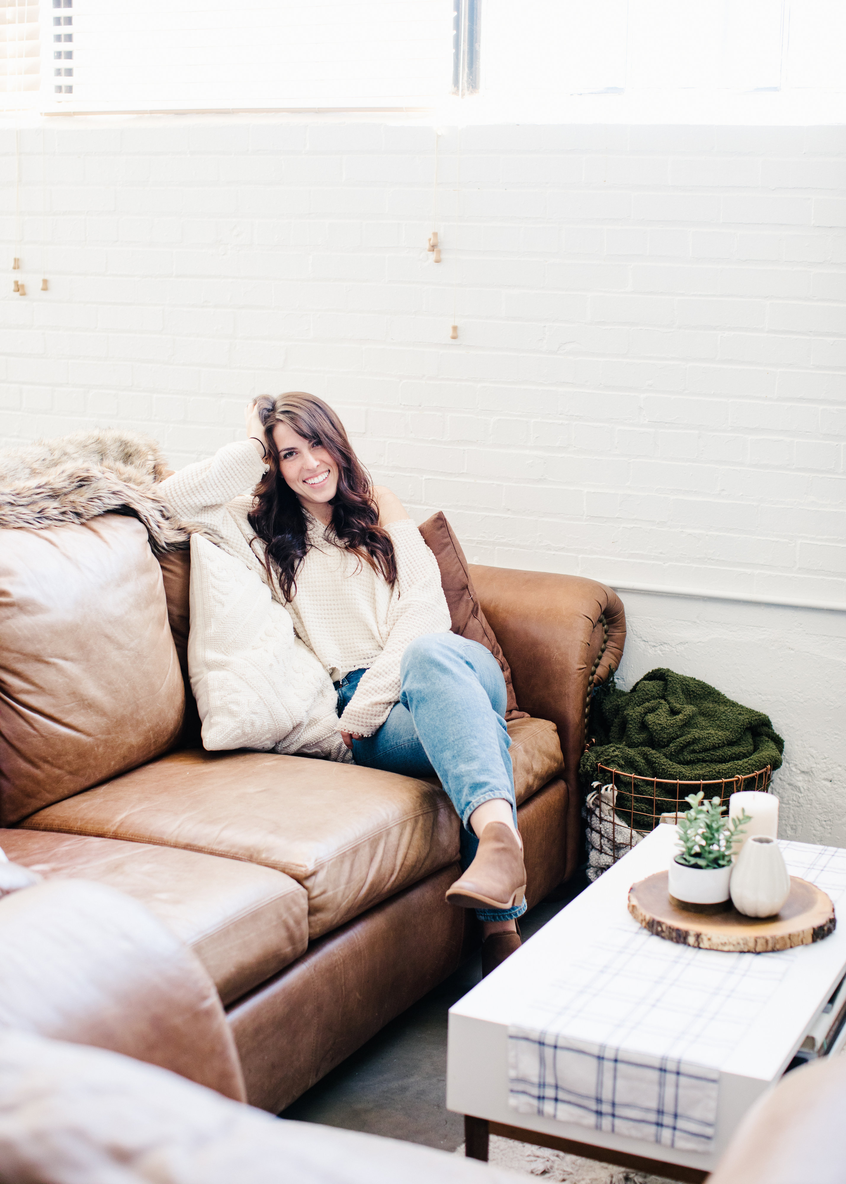 Natalie Jayne Photography headshot on stylish couch