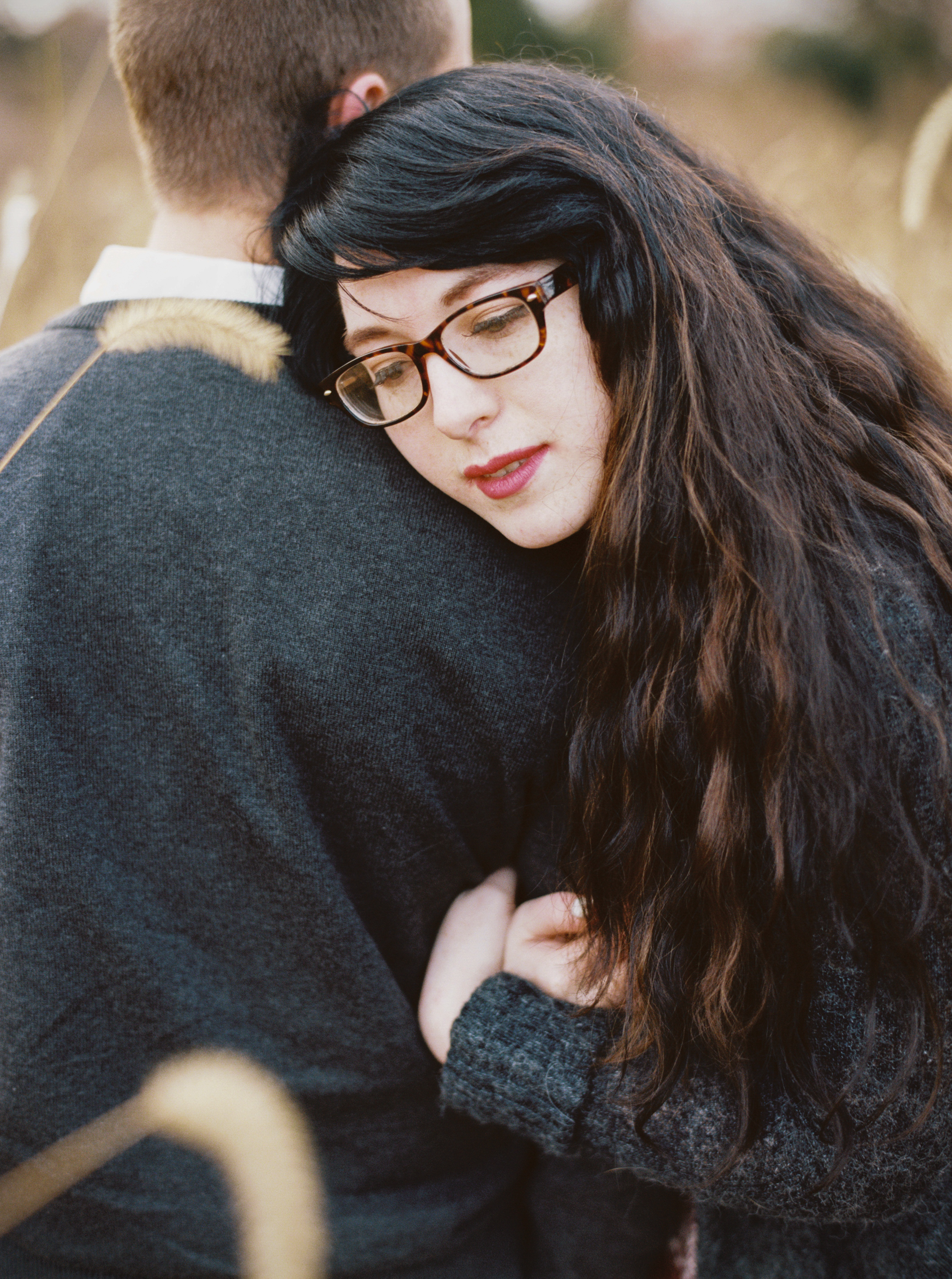 anniversary fall session couple snuggled up