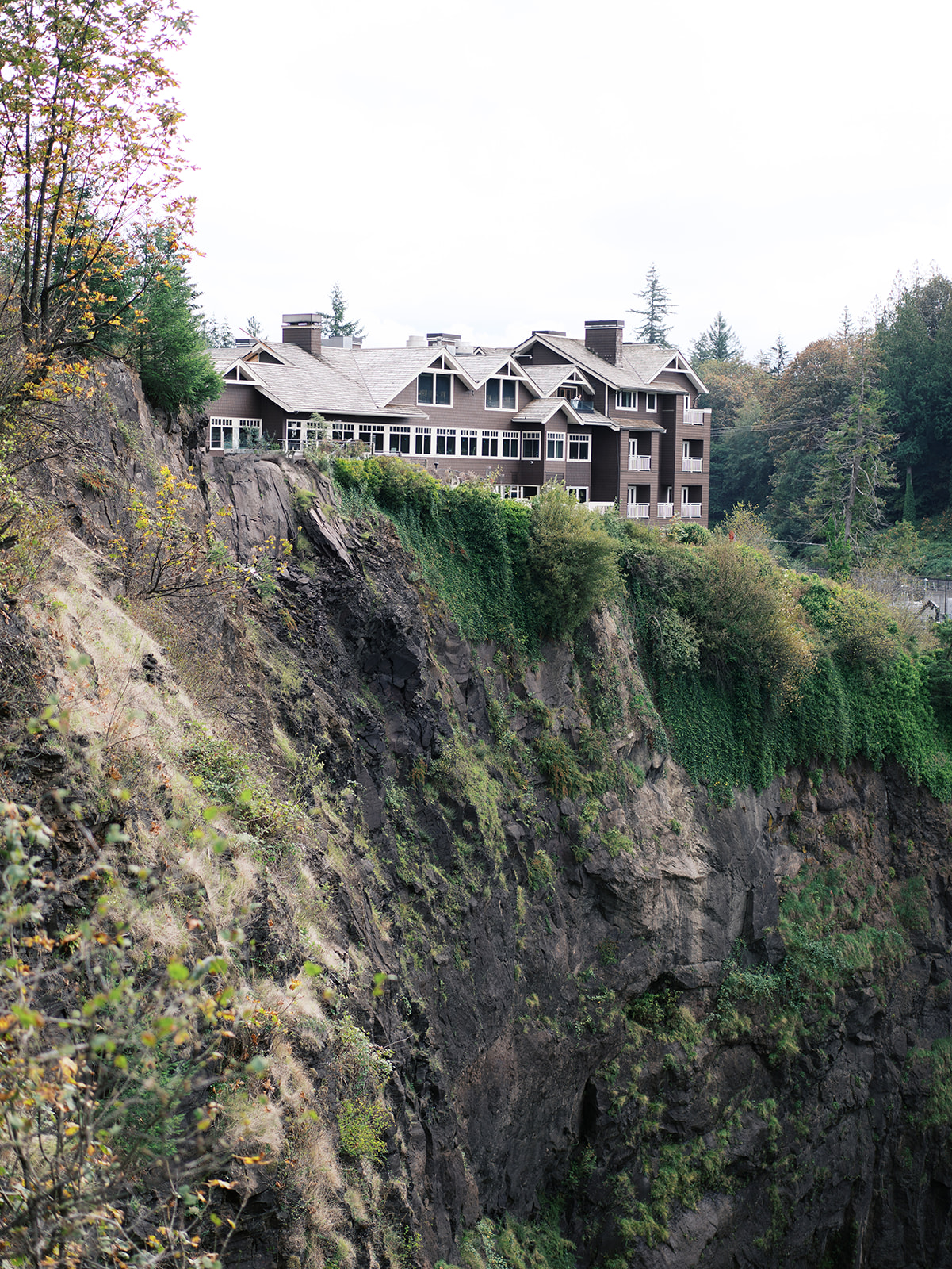 Iconic view of Snoqualmie Falls from Salish Lodge & Spa, captured by a wedding photographer.