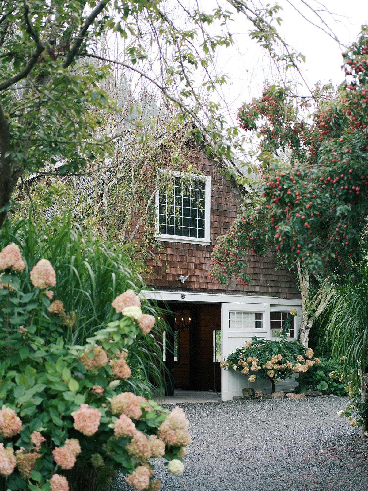 Rain-kissed greenery and gardens at Fox Hollow Farm, creating a romantic wedding backdrop